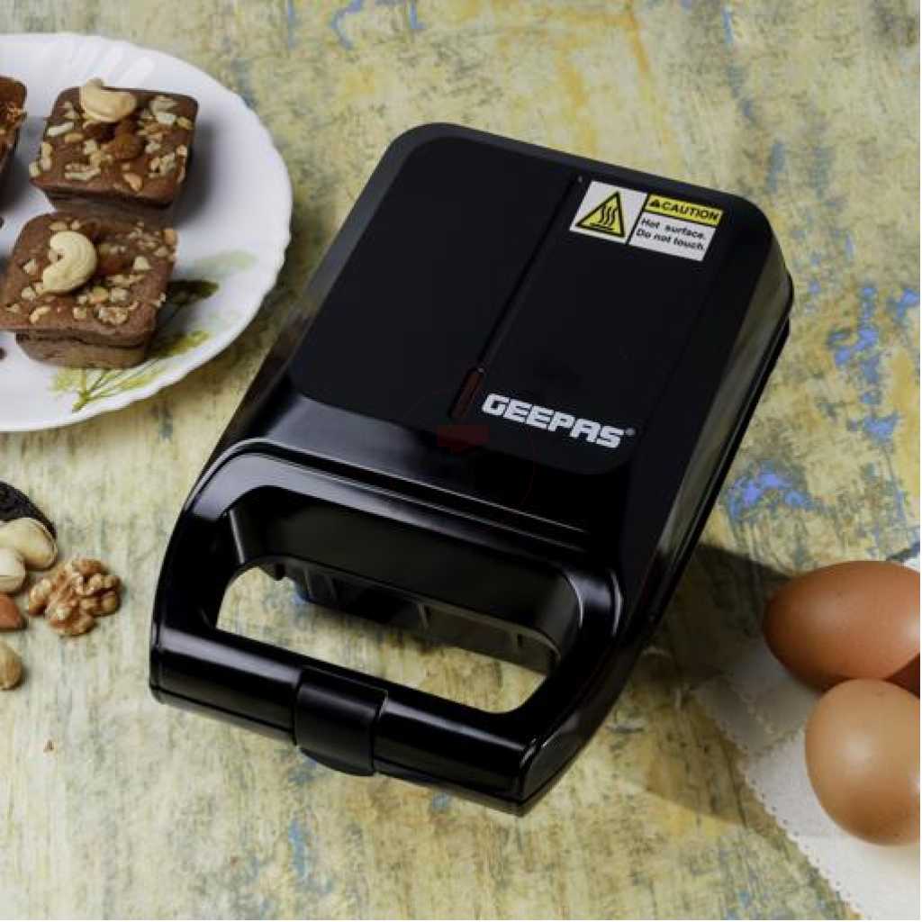 Geepas 4Pcs Brownie MakerBrownie Maker, 4 Bites At A Time, GBM63050 | Non-Stick Cooking Plate | Safety Lock | Cool Touch Handles | Skid -Resistance Feet | Power On & Ready Indicator - 600W